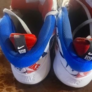 Boys Nike size 5 red, white,  blue, black, green